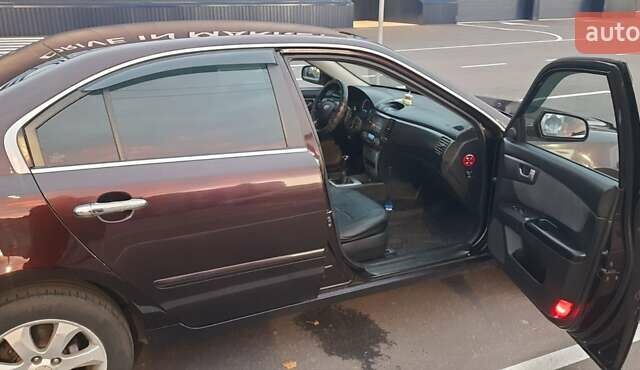 Коричневий Кіа Маджентіс, об'ємом двигуна 2 л та пробігом 278 тис. км за 5800 $, фото 5 на Automoto.ua