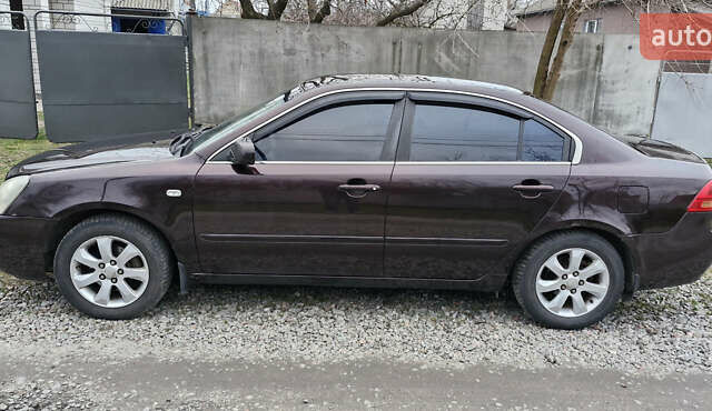 Коричневий Кіа Маджентіс, об'ємом двигуна 2 л та пробігом 458 тис. км за 4900 $, фото 2 на Automoto.ua