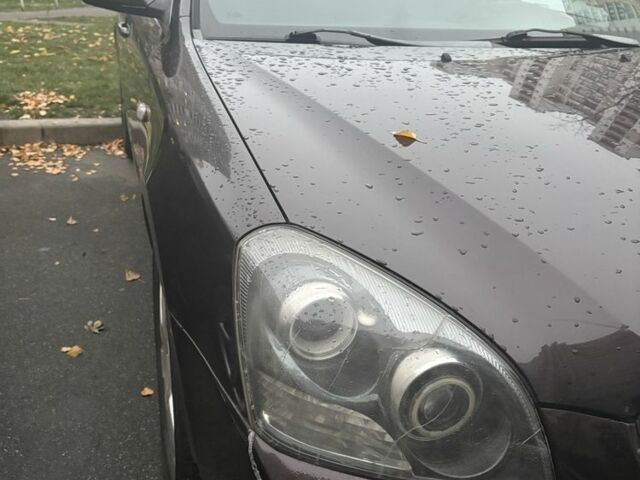 Коричневий Кіа Маджентіс, об'ємом двигуна 2 л та пробігом 355 тис. км за 4500 $, фото 7 на Automoto.ua