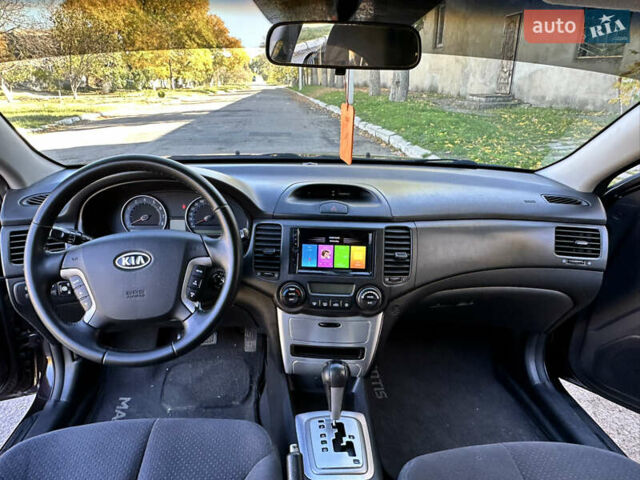 Коричневий Кіа Маджентіс, об'ємом двигуна 2 л та пробігом 191 тис. км за 4900 $, фото 10 на Automoto.ua
