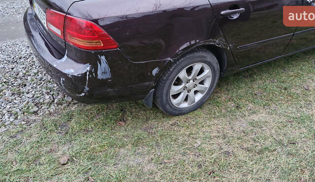 Коричневий Кіа Маджентіс, об'ємом двигуна 2 л та пробігом 458 тис. км за 4900 $, фото 10 на Automoto.ua