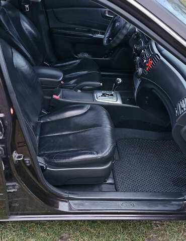 Коричневий Кіа Маджентіс, об'ємом двигуна 2 л та пробігом 458 тис. км за 4900 $, фото 5 на Automoto.ua