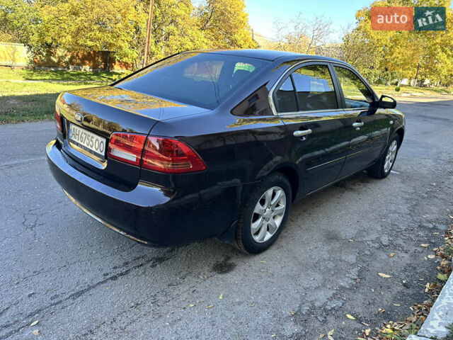 Коричневий Кіа Маджентіс, об'ємом двигуна 2 л та пробігом 191 тис. км за 4900 $, фото 7 на Automoto.ua