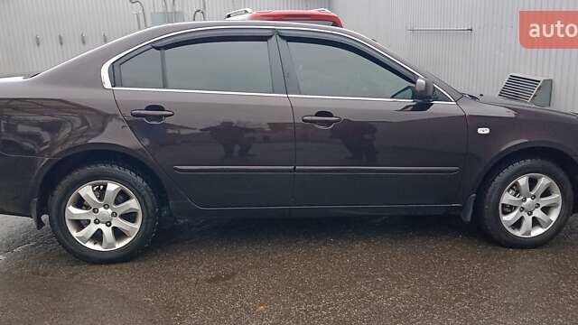 Коричневый Киа Маджентис, объемом двигателя 2 л и пробегом 221 тыс. км за 6200 $, фото 6 на Automoto.ua