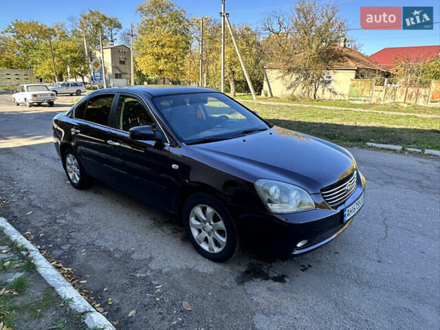 Коричневий Кіа Маджентіс, об'ємом двигуна 2 л та пробігом 191 тис. км за 4900 $, фото 9 на Automoto.ua