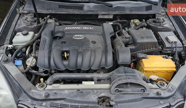 Коричневий Кіа Маджентіс, об'ємом двигуна 2 л та пробігом 458 тис. км за 4900 $, фото 9 на Automoto.ua