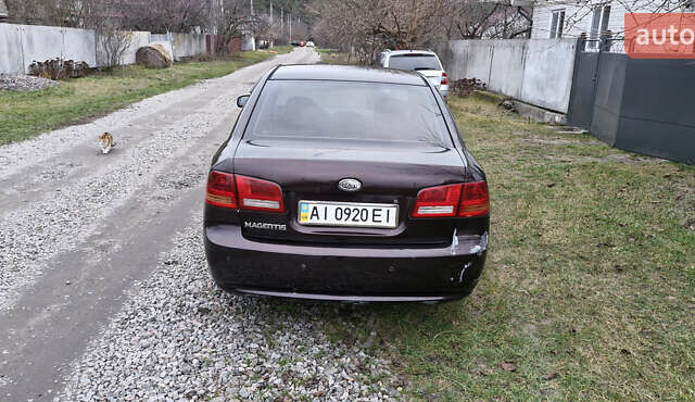 Коричневий Кіа Маджентіс, об'ємом двигуна 2 л та пробігом 458 тис. км за 4900 $, фото 3 на Automoto.ua