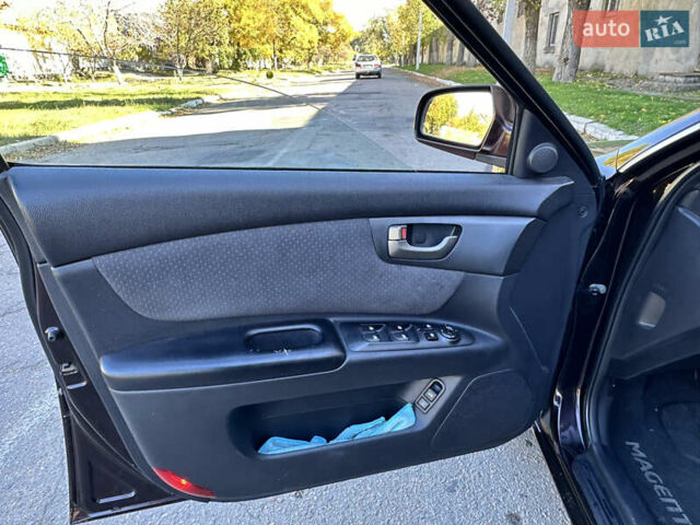 Коричневий Кіа Маджентіс, об'ємом двигуна 2 л та пробігом 191 тис. км за 4900 $, фото 14 на Automoto.ua