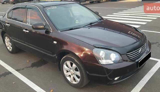 Коричневий Кіа Маджентіс, об'ємом двигуна 2 л та пробігом 278 тис. км за 5800 $, фото 3 на Automoto.ua