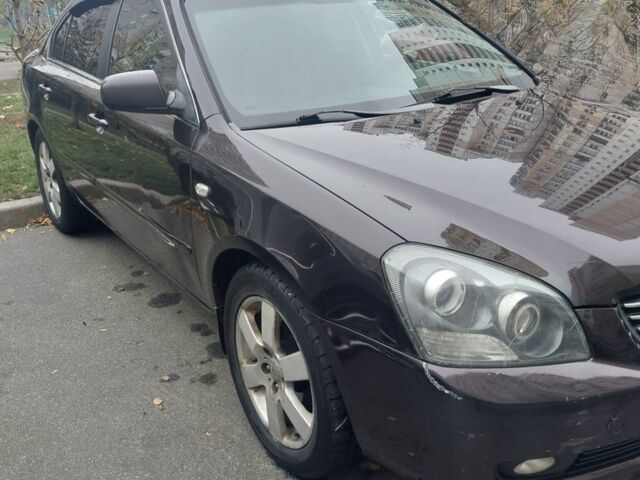 Коричневий Кіа Маджентіс, об'ємом двигуна 2 л та пробігом 355 тис. км за 4500 $, фото 5 на Automoto.ua