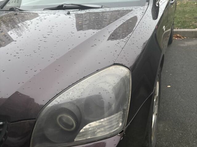 Коричневий Кіа Маджентіс, об'ємом двигуна 2 л та пробігом 355 тис. км за 4500 $, фото 6 на Automoto.ua