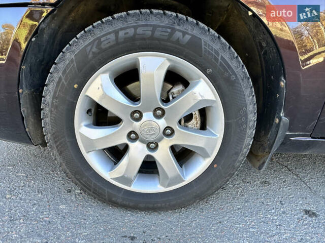 Коричневий Кіа Маджентіс, об'ємом двигуна 2 л та пробігом 191 тис. км за 4900 $, фото 18 на Automoto.ua