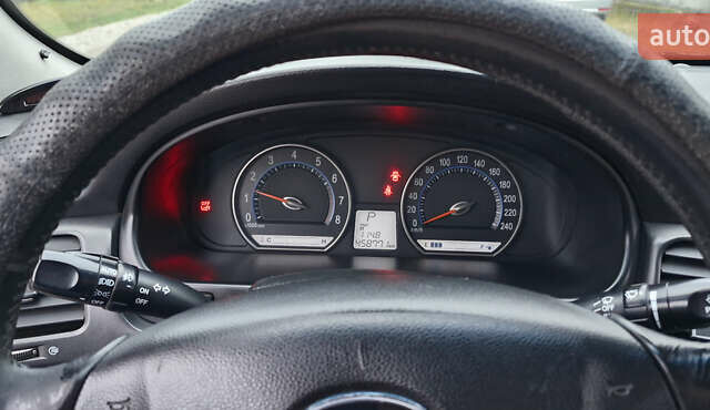 Коричневий Кіа Маджентіс, об'ємом двигуна 2 л та пробігом 458 тис. км за 4900 $, фото 8 на Automoto.ua