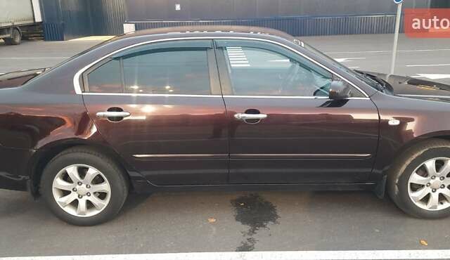 Коричневий Кіа Маджентіс, об'ємом двигуна 2 л та пробігом 278 тис. км за 5800 $, фото 9 на Automoto.ua