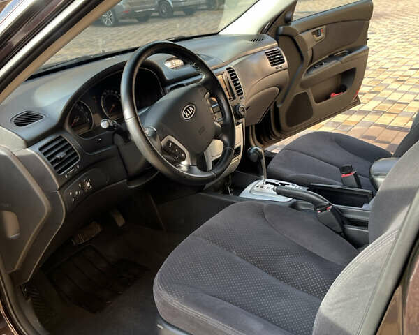 Коричневый Киа Маджентис, объемом двигателя 2 л и пробегом 192 тыс. км за 5900 $, фото 12 на Automoto.ua