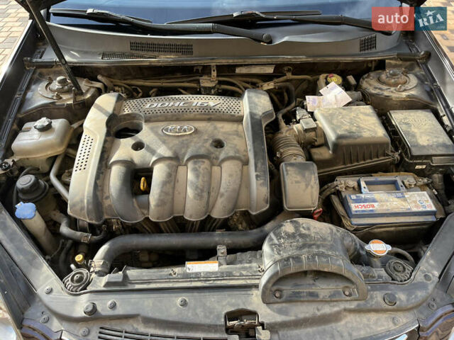 Коричневый Киа Маджентис, объемом двигателя 2 л и пробегом 192 тыс. км за 5900 $, фото 26 на Automoto.ua