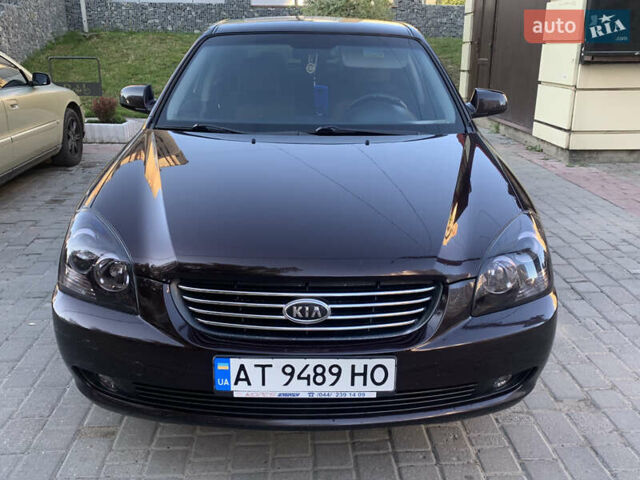 Коричневий Кіа Маджентіс, об'ємом двигуна 2 л та пробігом 200 тис. км за 5300 $, фото 1 на Automoto.ua