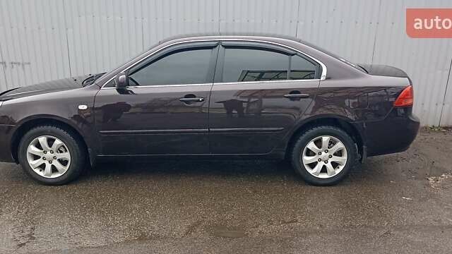 Коричневый Киа Маджентис, объемом двигателя 2 л и пробегом 221 тыс. км за 6200 $, фото 2 на Automoto.ua