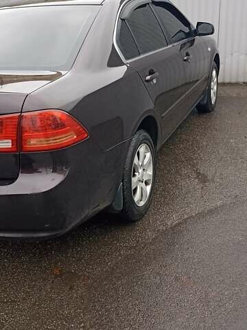 Коричневый Киа Маджентис, объемом двигателя 2 л и пробегом 221 тыс. км за 6200 $, фото 5 на Automoto.ua