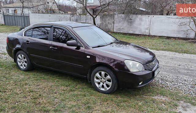 Коричневий Кіа Маджентіс, об'ємом двигуна 2 л та пробігом 458 тис. км за 4900 $, фото 1 на Automoto.ua