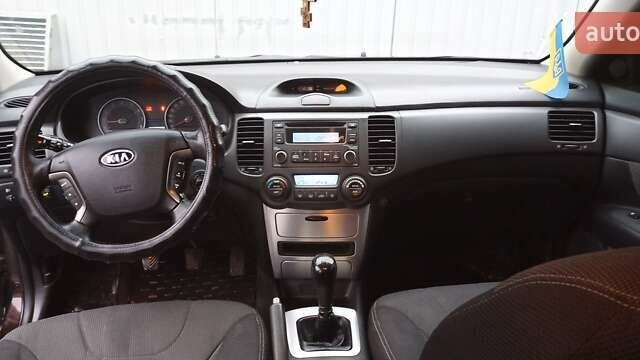 Коричневый Киа Маджентис, объемом двигателя 2 л и пробегом 221 тыс. км за 6200 $, фото 14 на Automoto.ua
