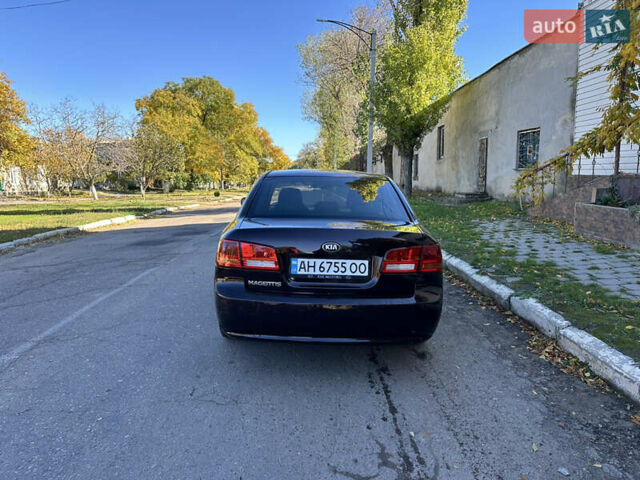 Коричневий Кіа Маджентіс, об'ємом двигуна 2 л та пробігом 191 тис. км за 4900 $, фото 6 на Automoto.ua