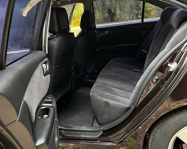 Коричневый Киа Маджентис, объемом двигателя 2.66 л и пробегом 209 тыс. км за 6200 $, фото 7 на Automoto.ua