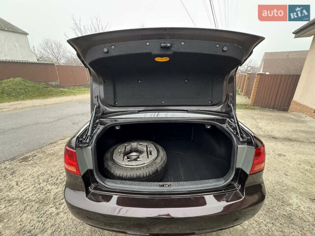 Коричневий Кіа Маджентіс, об'ємом двигуна 2 л та пробігом 157 тис. км за 5900 $, фото 34 на Automoto.ua