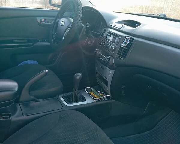 Коричневый Киа Маджентис, объемом двигателя 2 л и пробегом 256 тыс. км за 4600 $, фото 2 на Automoto.ua