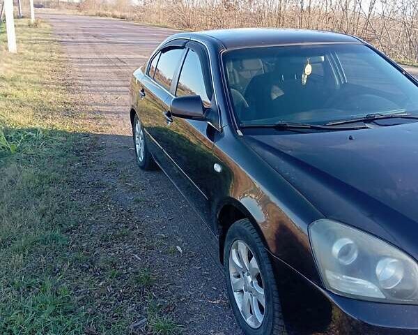 Коричневый Киа Маджентис, объемом двигателя 2 л и пробегом 256 тыс. км за 4600 $, фото 5 на Automoto.ua