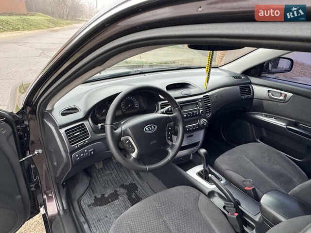 Коричневий Кіа Маджентіс, об'ємом двигуна 2 л та пробігом 157 тис. км за 5900 $, фото 22 на Automoto.ua