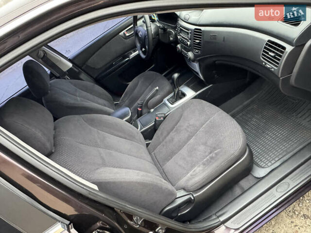 Коричневий Кіа Маджентіс, об'ємом двигуна 2 л та пробігом 157 тис. км за 5900 $, фото 24 на Automoto.ua