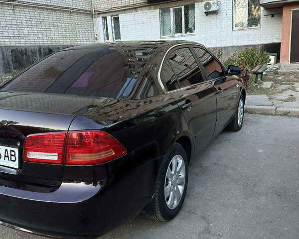 Коричневий Кіа Маджентіс, об'ємом двигуна 2 л та пробігом 180 тис. км за 5800 $, фото 5 на Automoto.ua