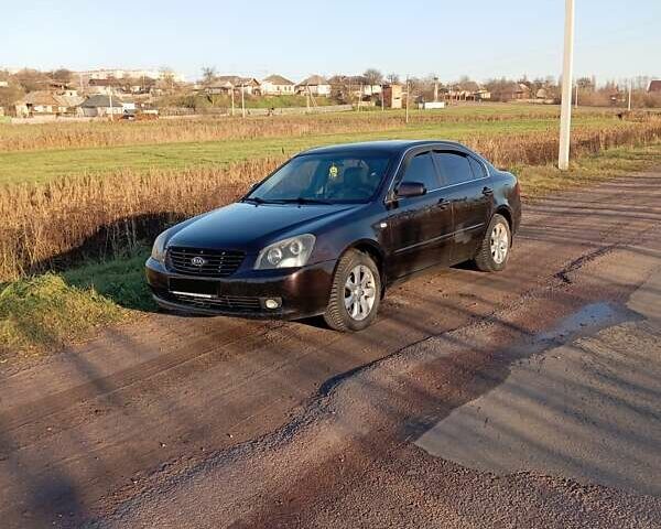 Коричневый Киа Маджентис, объемом двигателя 2 л и пробегом 256 тыс. км за 4600 $, фото 6 на Automoto.ua