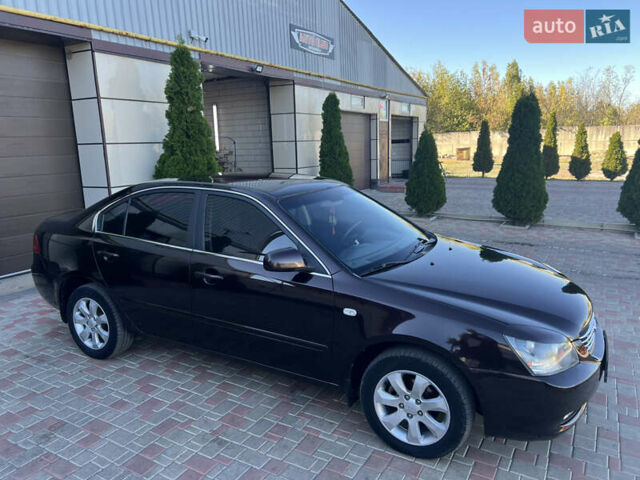 Коричневий Кіа Маджентіс, об'ємом двигуна 2 л та пробігом 150 тис. км за 6250 $, фото 3 на Automoto.ua