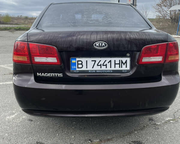 Коричневий Кіа Маджентіс, об'ємом двигуна 2 л та пробігом 170 тис. км за 6808 $, фото 1 на Automoto.ua