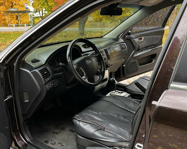 Коричневый Киа Маджентис, объемом двигателя 2.66 л и пробегом 209 тыс. км за 6200 $, фото 5 на Automoto.ua