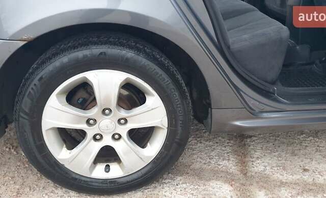 Коричневый Киа Маджентис, объемом двигателя 2 л и пробегом 294 тыс. км за 5500 $, фото 16 на Automoto.ua