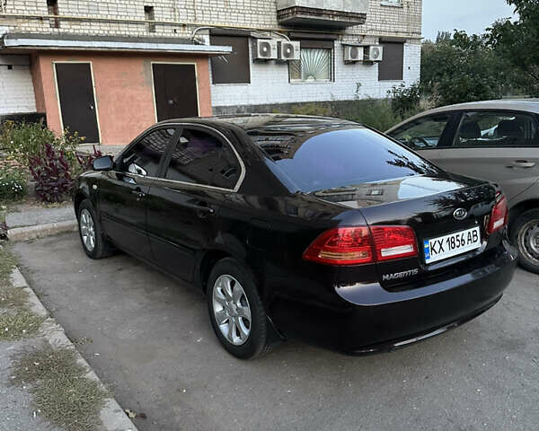 Коричневий Кіа Маджентіс, об'ємом двигуна 2 л та пробігом 180 тис. км за 5800 $, фото 4 на Automoto.ua