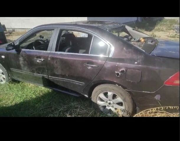 Коричневий Кіа Маджентіс, об'ємом двигуна 2 л та пробігом 185 тис. км за 1700 $, фото 3 на Automoto.ua