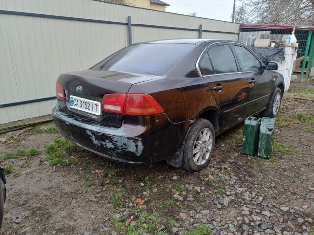 Коричневий Кіа Маджентіс, об'ємом двигуна 2 л та пробігом 200 тис. км за 2700 $, фото 3 на Automoto.ua