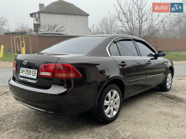 Коричневий Кіа Маджентіс, об'ємом двигуна 2 л та пробігом 157 тис. км за 5900 $, фото 8 на Automoto.ua