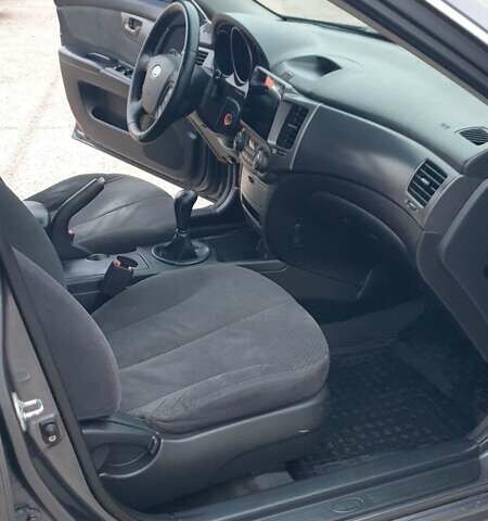 Коричневый Киа Маджентис, объемом двигателя 2 л и пробегом 294 тыс. км за 5500 $, фото 37 на Automoto.ua