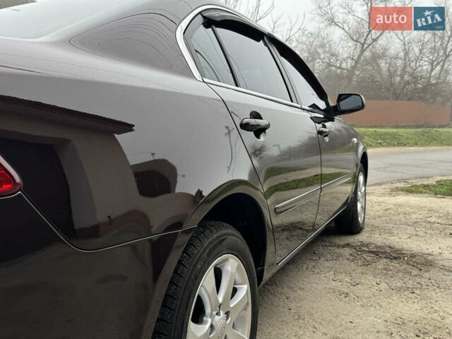 Коричневий Кіа Маджентіс, об'ємом двигуна 2 л та пробігом 157 тис. км за 5900 $, фото 15 на Automoto.ua