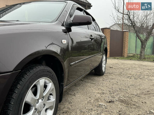 Коричневий Кіа Маджентіс, об'ємом двигуна 2 л та пробігом 157 тис. км за 5900 $, фото 13 на Automoto.ua