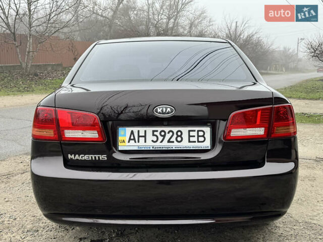 Коричневий Кіа Маджентіс, об'ємом двигуна 2 л та пробігом 157 тис. км за 5900 $, фото 6 на Automoto.ua