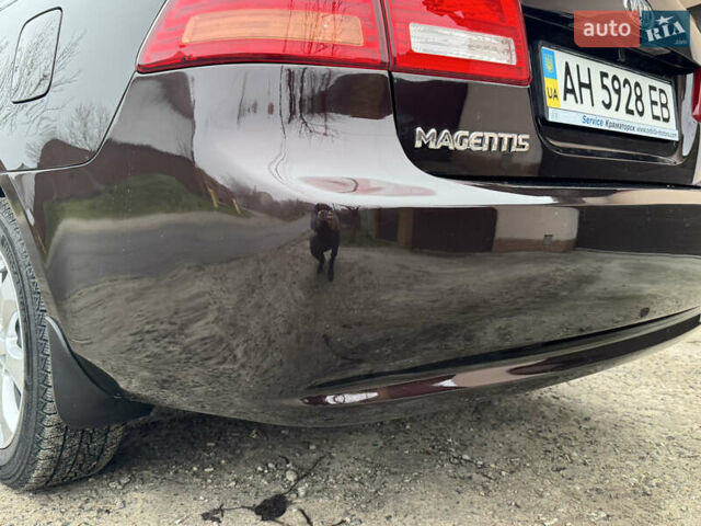 Коричневий Кіа Маджентіс, об'ємом двигуна 2 л та пробігом 157 тис. км за 5900 $, фото 19 на Automoto.ua