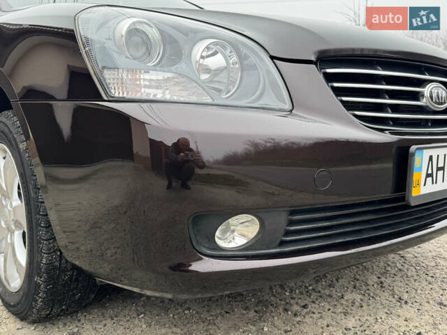 Коричневий Кіа Маджентіс, об'ємом двигуна 2 л та пробігом 157 тис. км за 5900 $, фото 17 на Automoto.ua