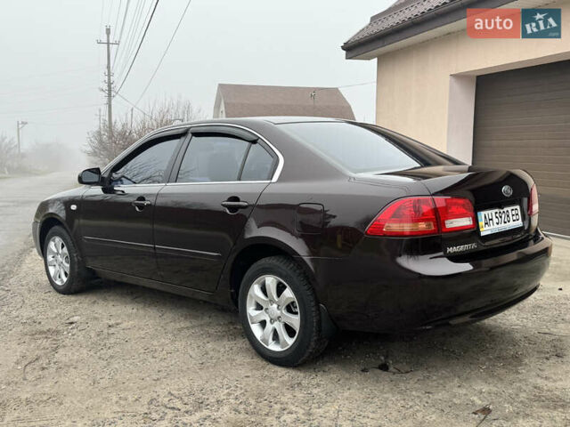 Коричневий Кіа Маджентіс, об'ємом двигуна 2 л та пробігом 157 тис. км за 5900 $, фото 4 на Automoto.ua