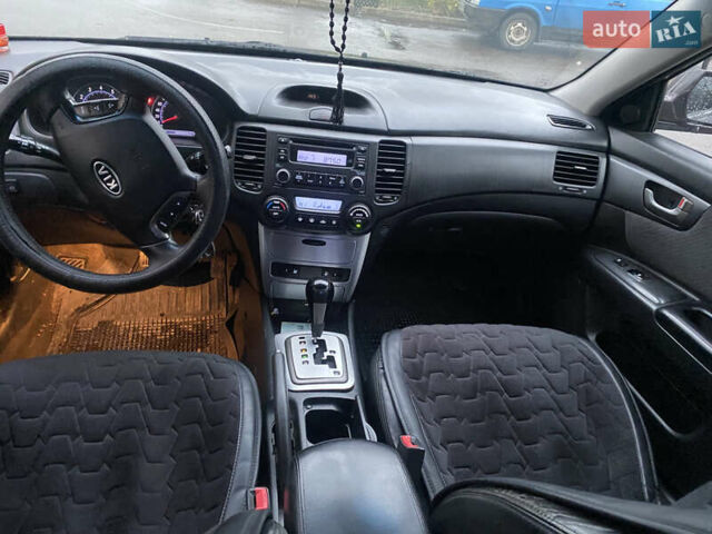 Коричневий Кіа Маджентіс, об'ємом двигуна 2 л та пробігом 245 тис. км за 4000 $, фото 5 на Automoto.ua